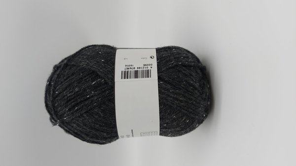 Trachtenwolle schwarz mit weißen flecken